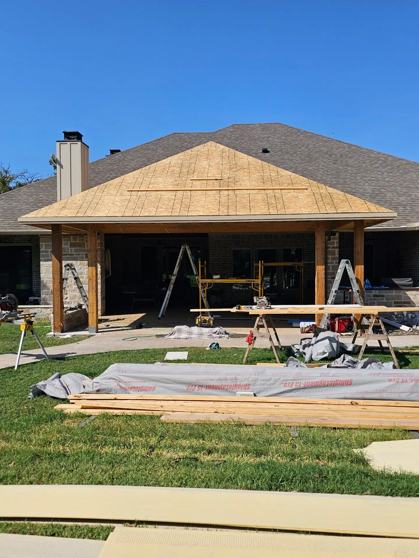 Outdoor living roof structure under construction